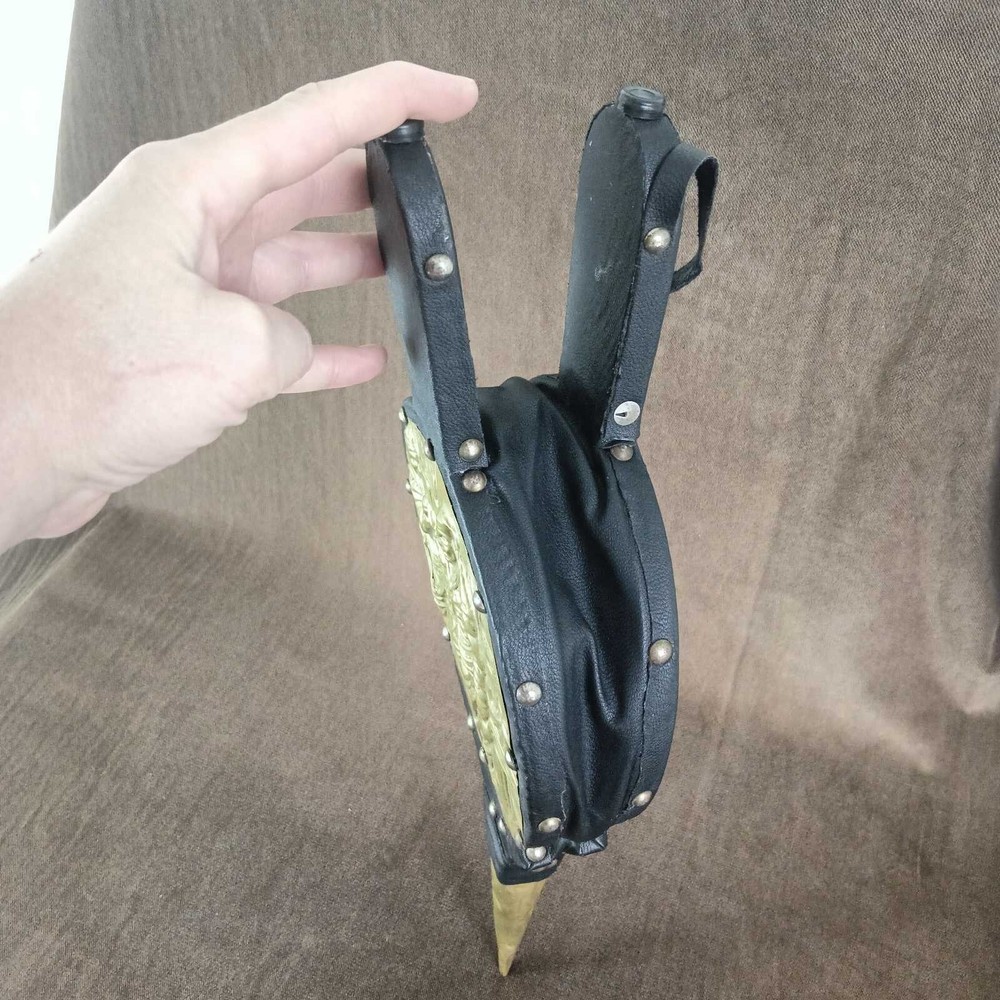 blacksmith's bellows or for lighting a barbecue or decoration