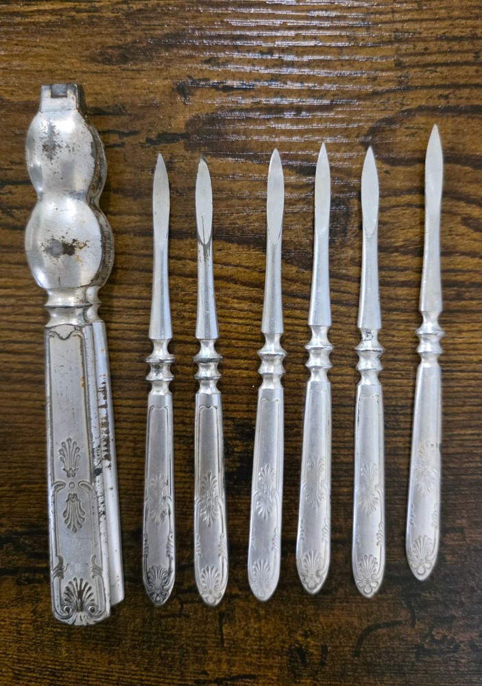 7pc VTG 1847 Rogers Bros Silver Plate Ornate Nutcracker & Pick Set