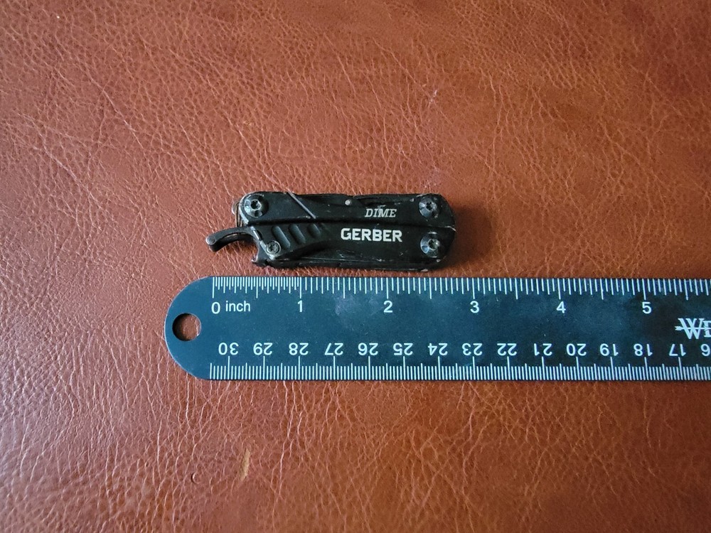 One Gerber Dime Pocket Multitool TSA Good Condition!