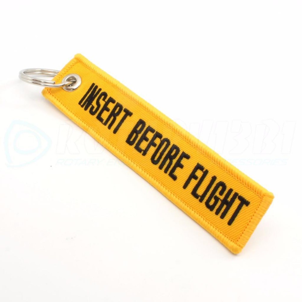 INSERT BEFORE FLIGHT QTY= 1 PC YELLOW/black KEYCHAIN RING TAGS CABIN CREW PILOT