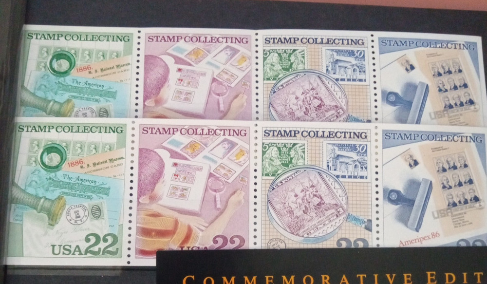 2" 3 ring binder w/ 5 pages of stamps over 100 usable stamps mostly US