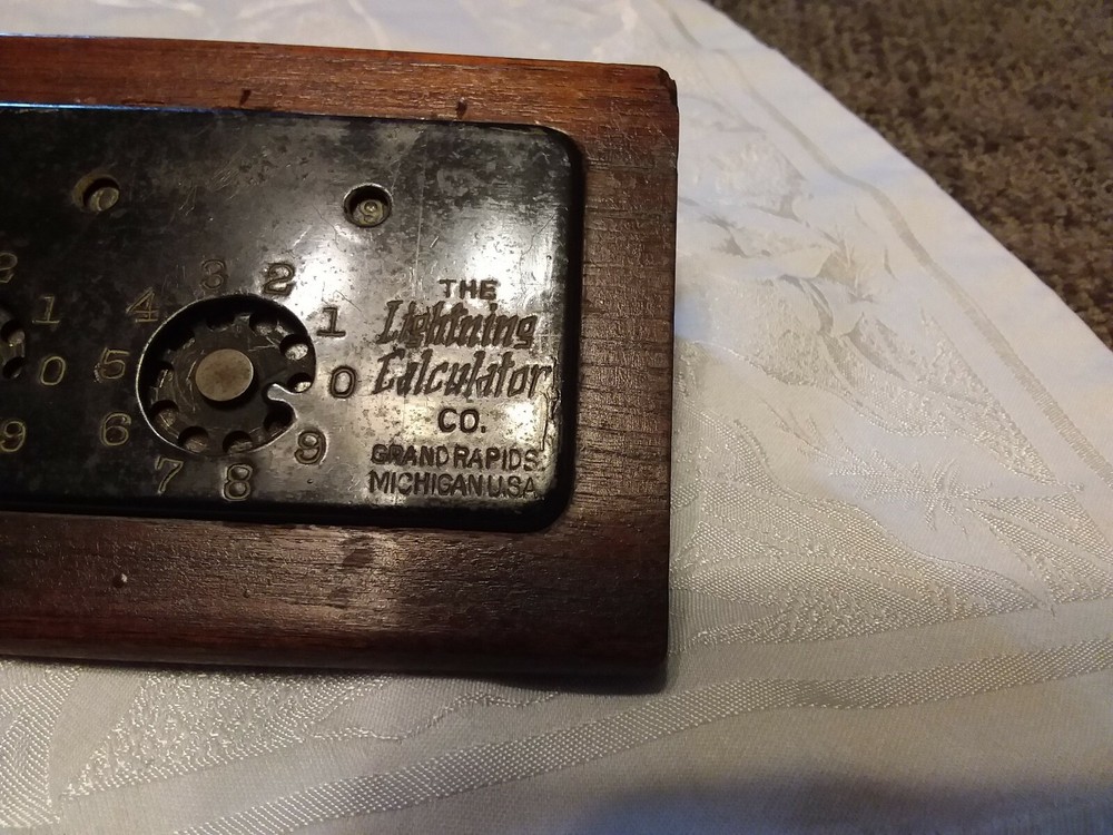 ANTIQUE c.1908 "LIGHTNING CALCULATOR COMPANY" ADDING MACHINE, WOOD BASE,13" L
