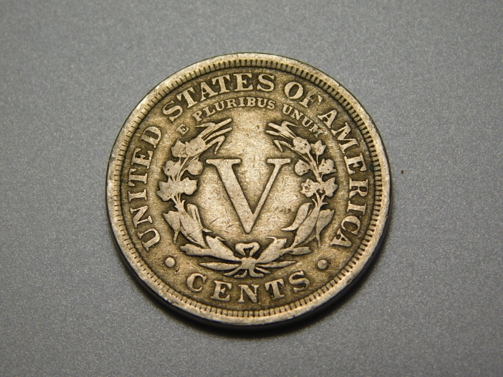 US COIN 1910 LIBERTY HEAD V NICKEL SLIGHTLY OFF CENTER