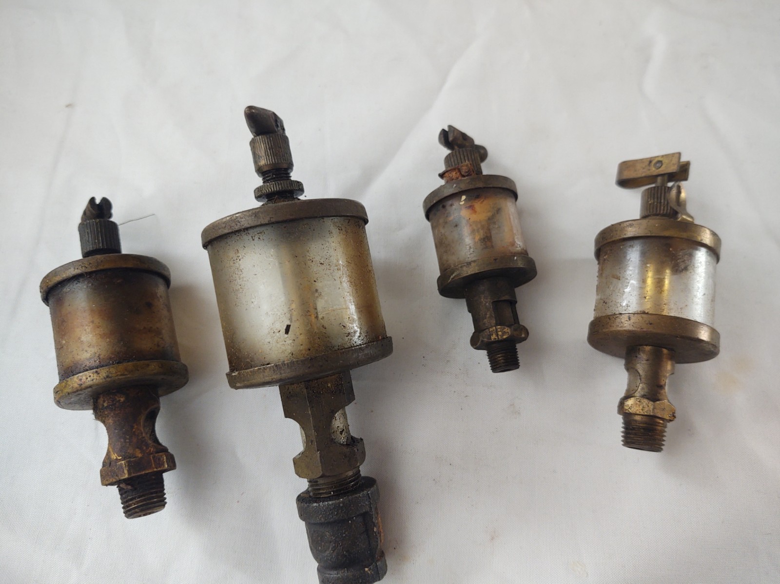 Lot of 4 Antique Vtg Brass Oilers Oil-Rite ,Essex , Lonergan & unbranded