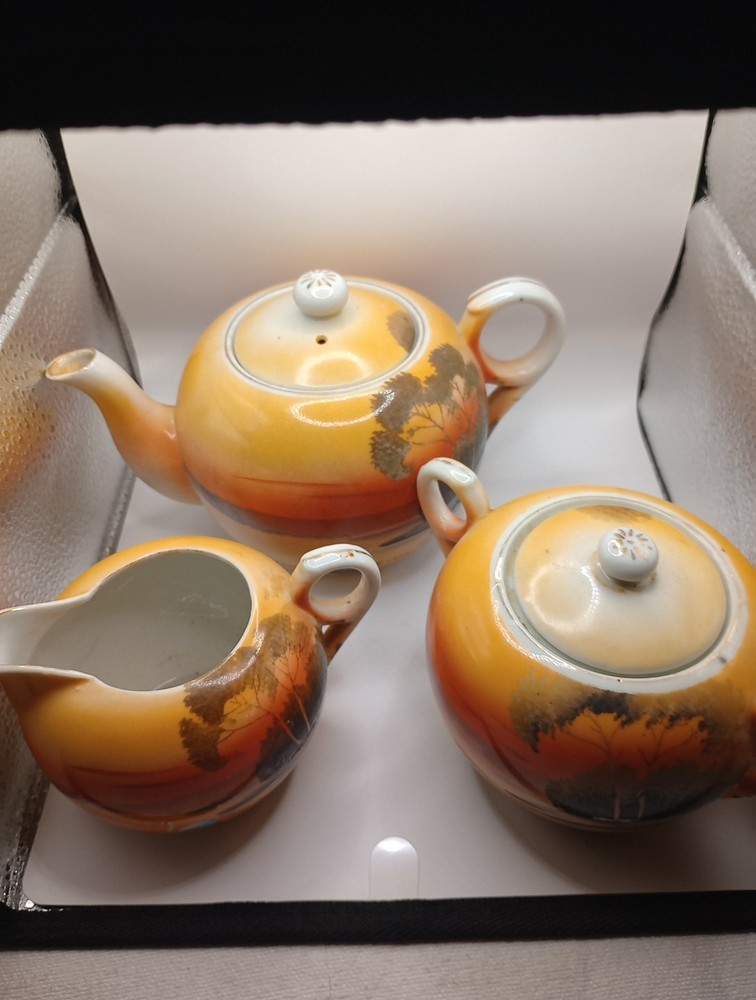 tea pot cream and sugar set