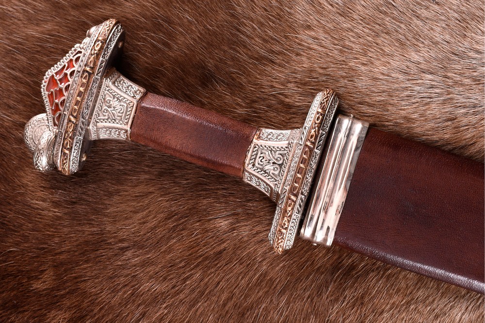 Vendel period sword with sheath, mint brass handle
