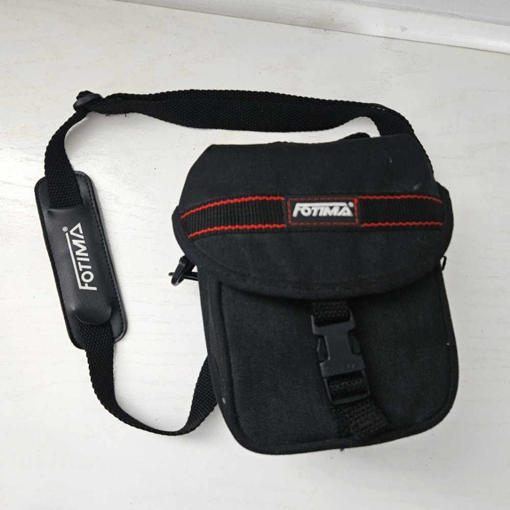 Fotima black camera carrying case model no. 60C with strap and pockets