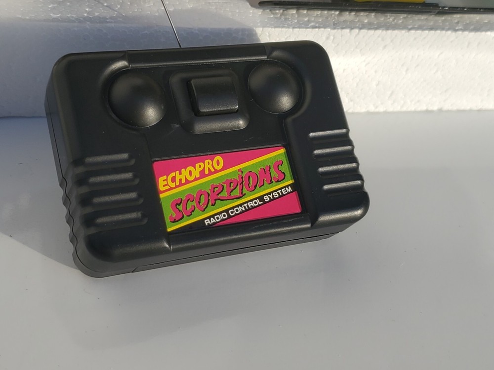 Vtg 1993 Echopro Radio Controlled Scorpion Racing Set. Missing one controller