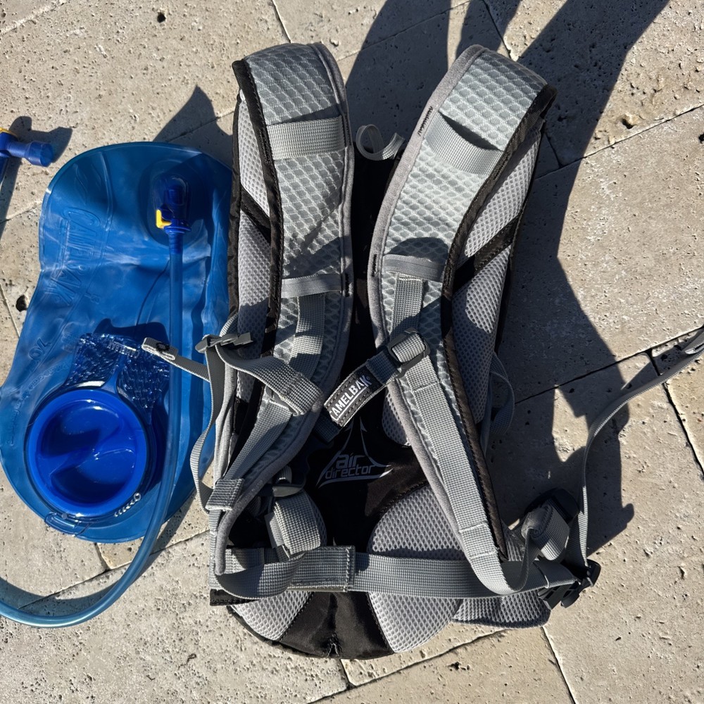 Black CAMELBAK magic Hydration Back Pack w/ Blue 2 Liter/70oz Bladder XV