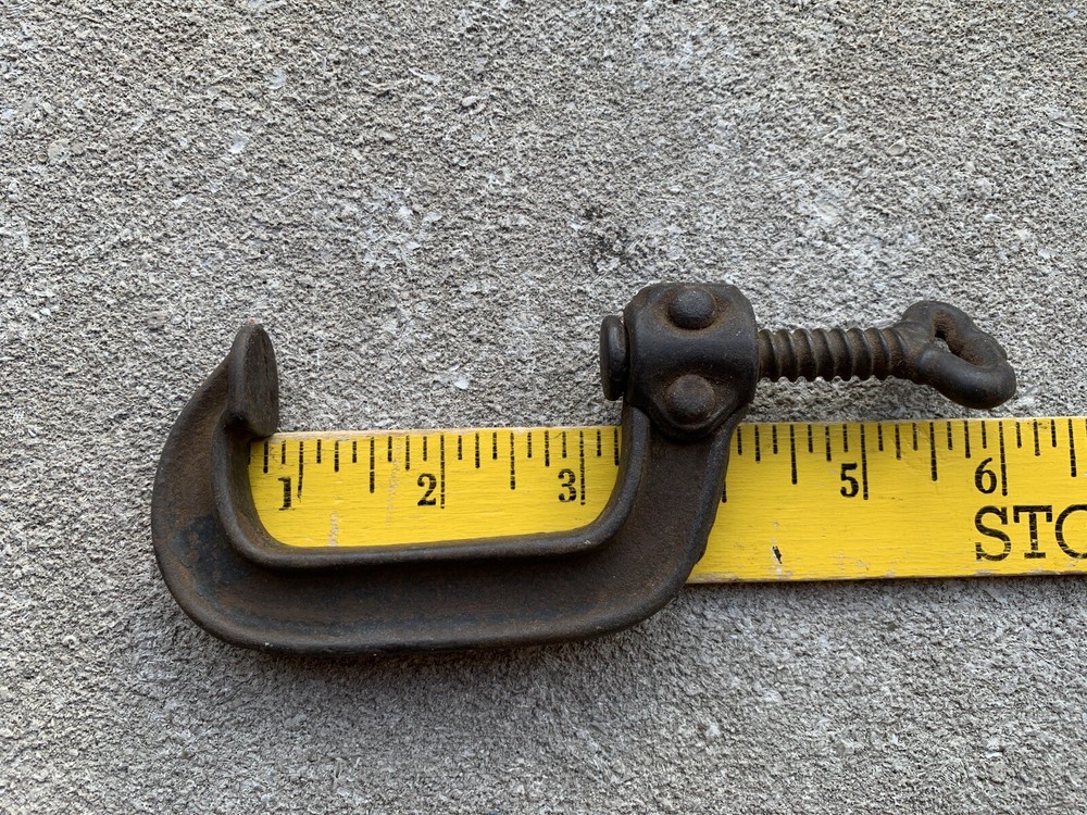 Small iron clamp held together with pins