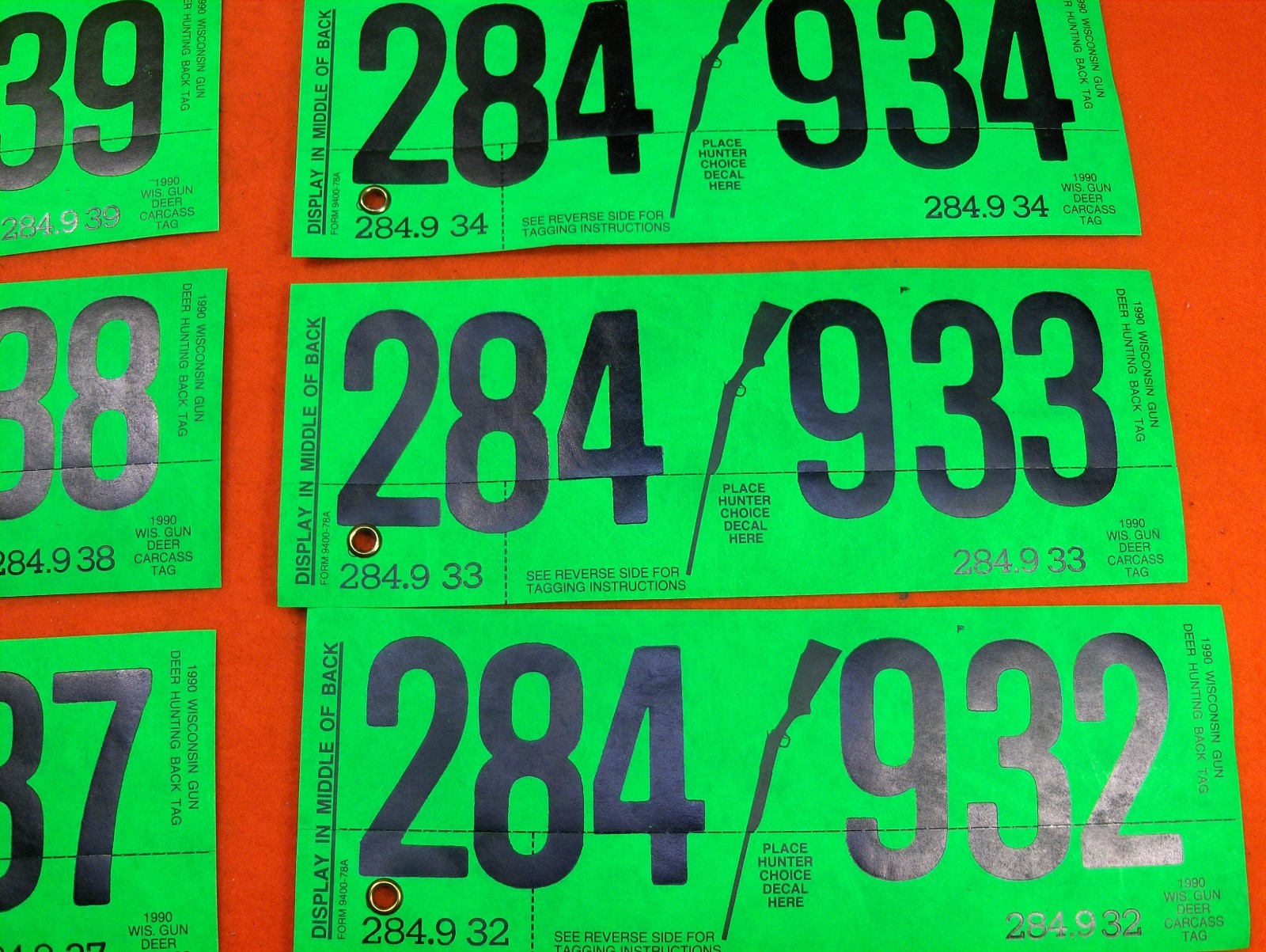 LOT OF 10 1990 CONSECUTIVE WISCONSIN DNR DEER LICENSE HUNTING GUN BACK TAGS