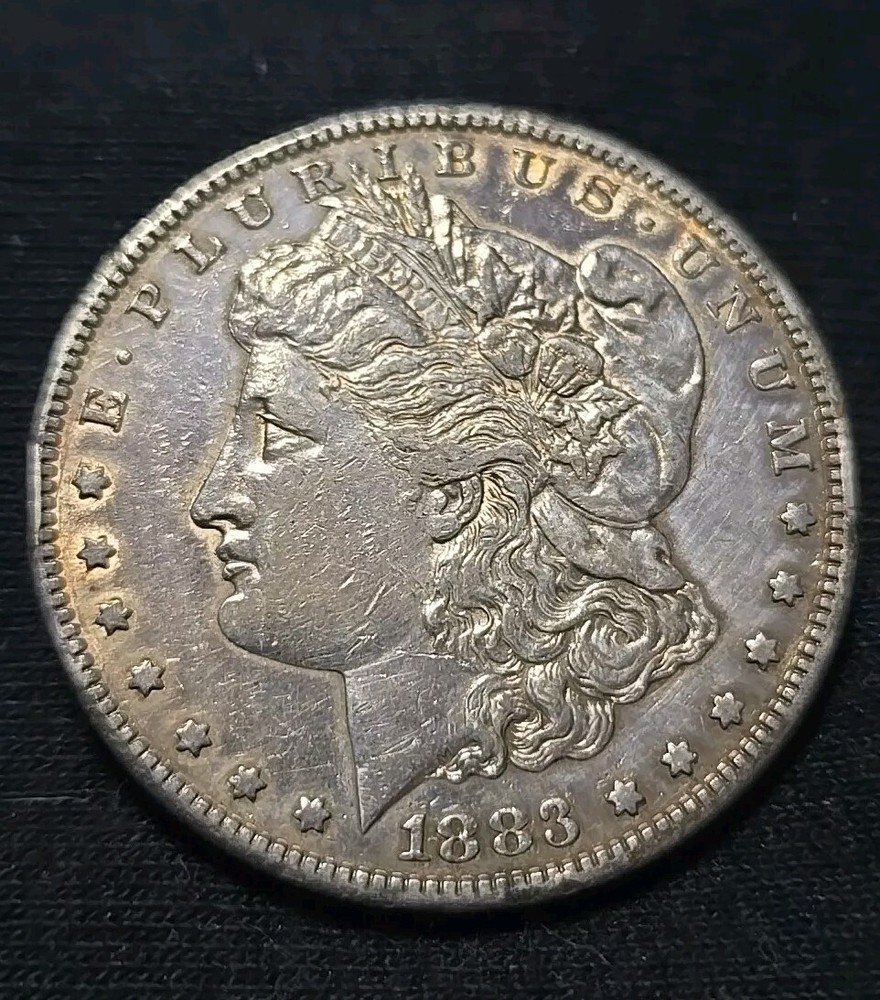 1883 S MORGAN SILVER DOLLAR - AU+ (LIGHT CLEANING)