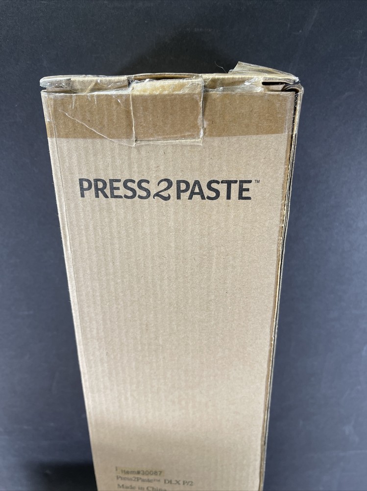 NOS RC Press to Paste -toothbrush holder and toothpaste dispenser