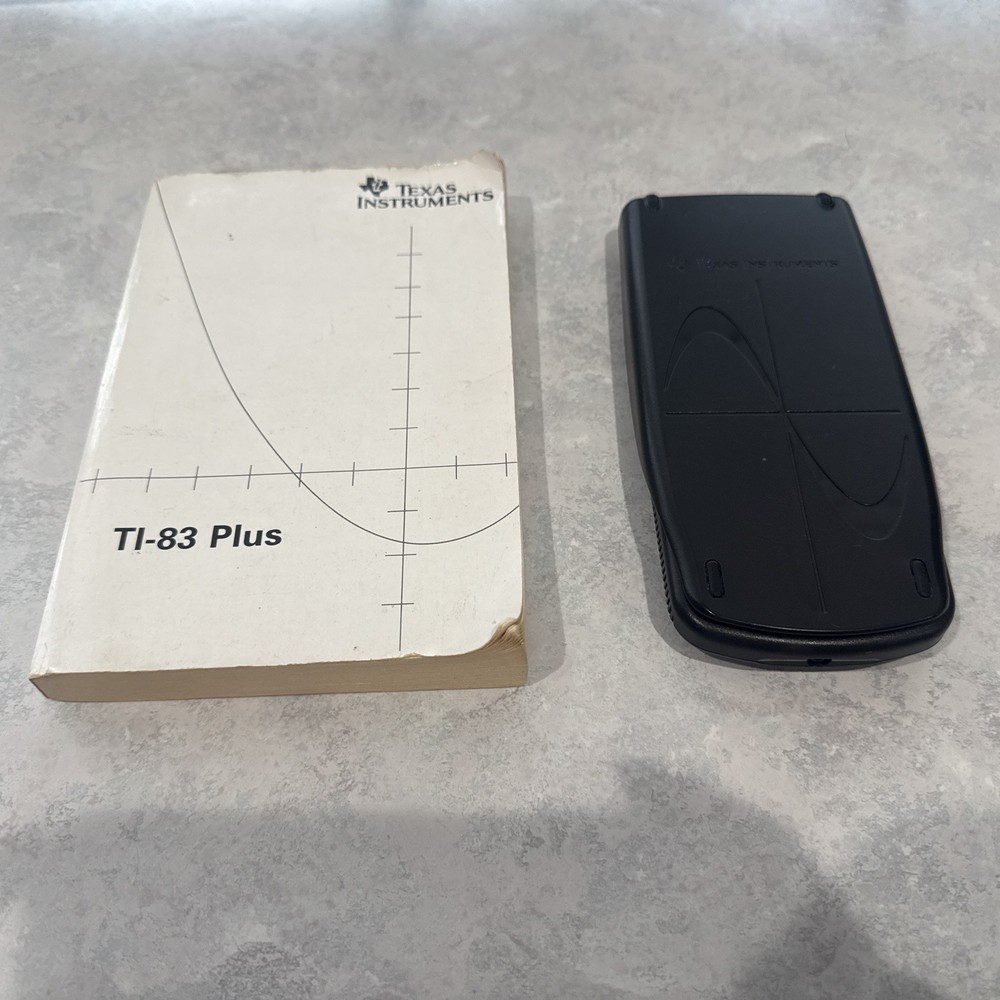 Texas instruments TI-83 plus graphing calculator Used Working with Handbook
