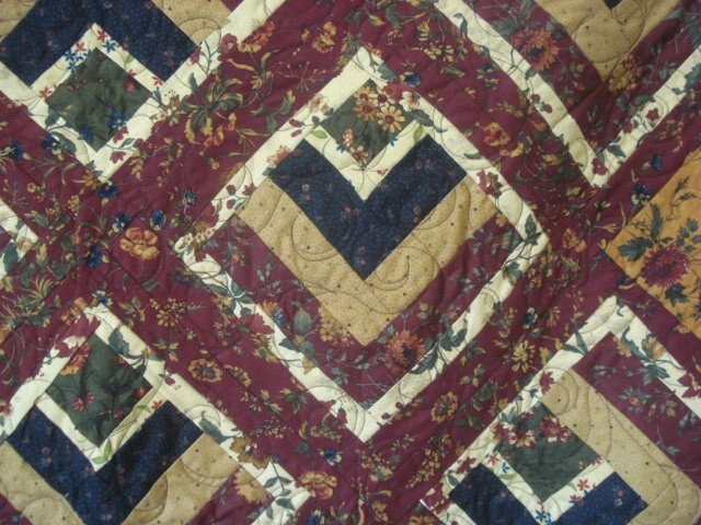 hand made quilt, lap robe or wall hanging machine quilted