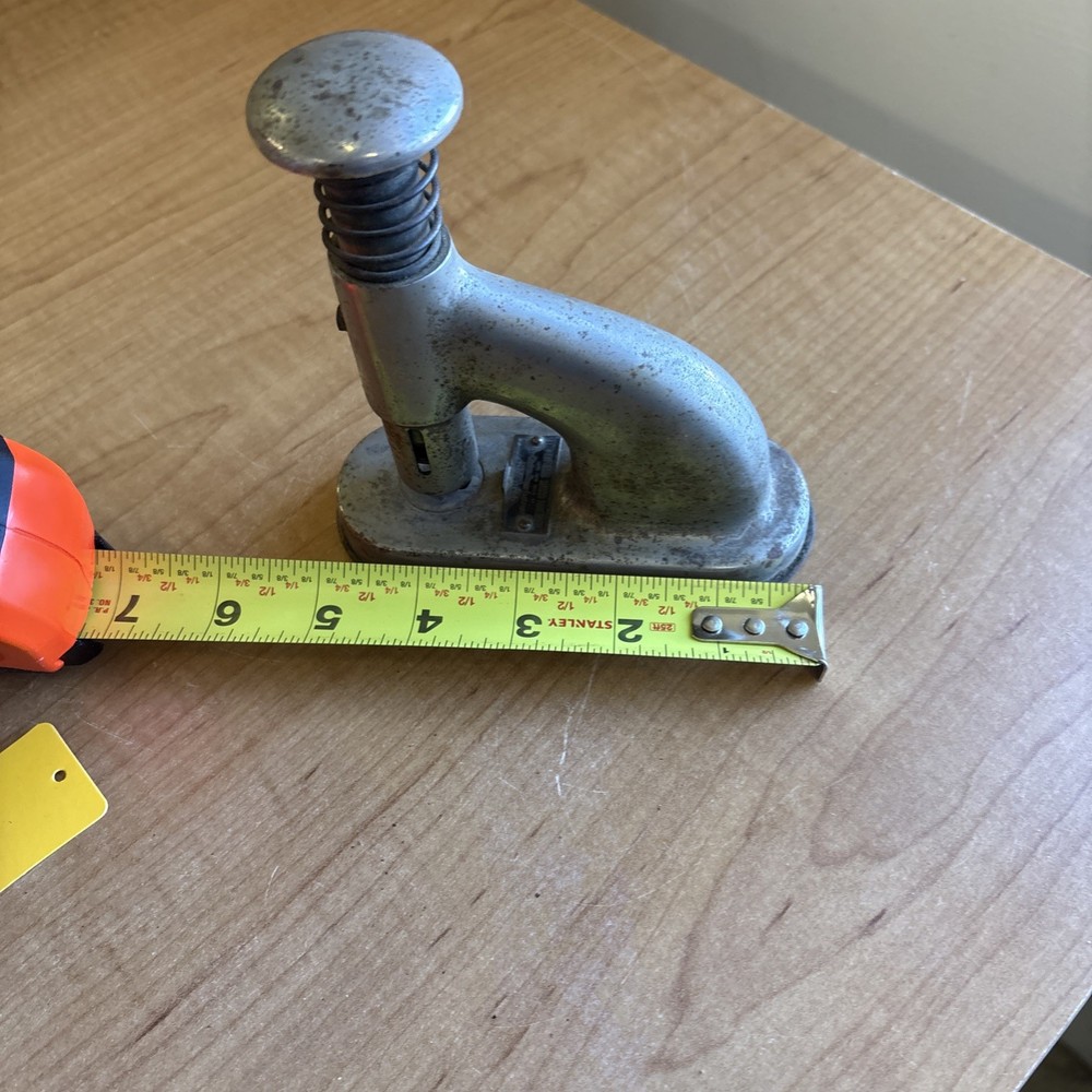 The Clipless Stand Machine - The Clipless Paper Fastener Co. - Newton, Iowa