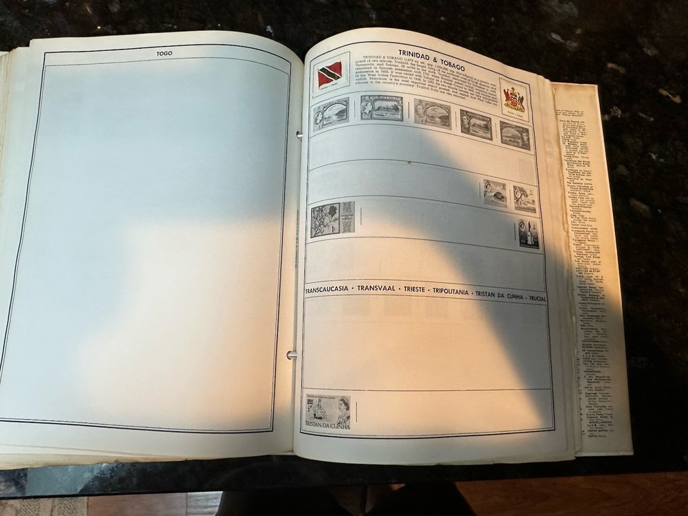 VTG 1977 Traveler Stamp Album With Many Stamps.