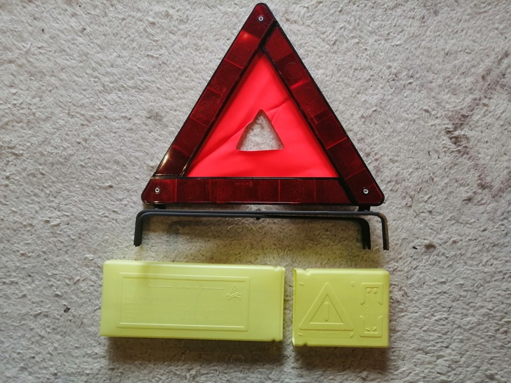 old warning triangle car jack