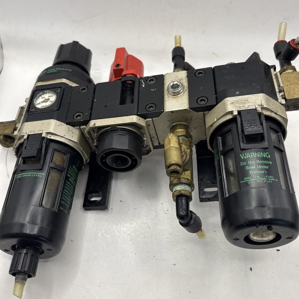 Miller Filter Regulator, Exhaust Valve, Distributor, And Lubricator Assembly