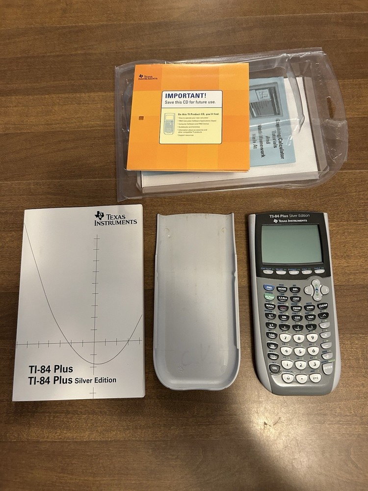 Texas Instruments TI-84 Plus Silver Edition Graphing Calculator With Manual/CD