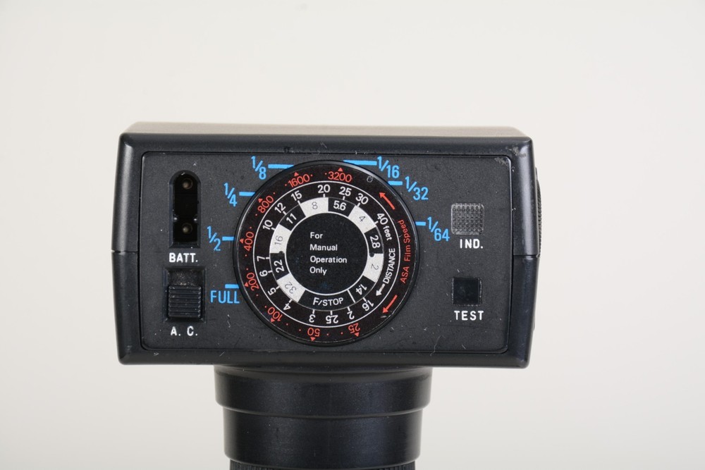 Sunpak Auto 511 Handle Mount Flash w/ Bracket. Fair condition. Tested Good 498