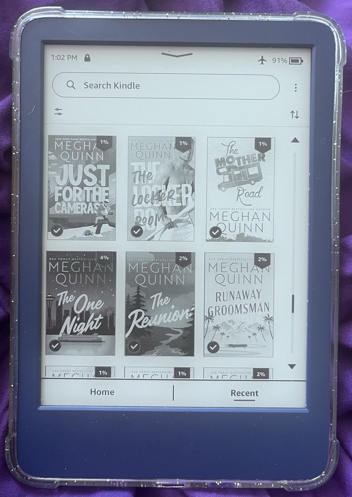 Amazon Kindle ereader Blue with books
