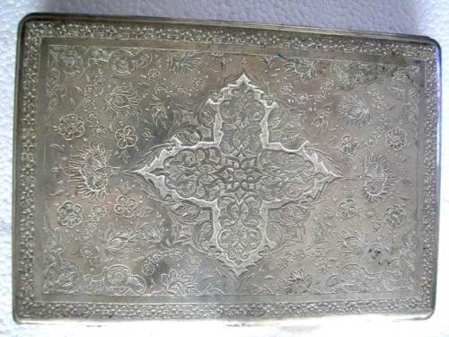 A VINTAGE MIDDLE EASTERN SILVER CIGARETTE CASE