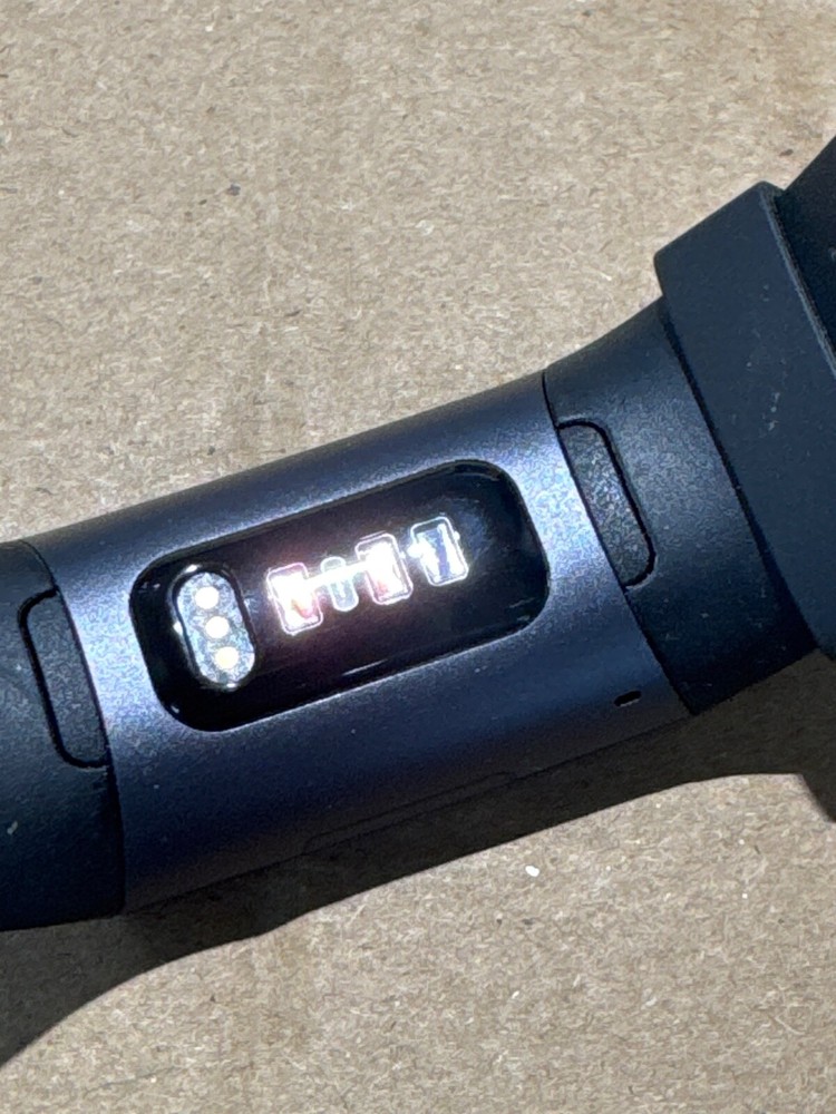 fit bit charge 3 or 4 , tiny ding on bottom of screen