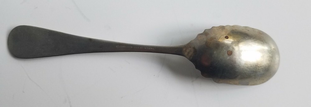 Antique 6 in Shell shape and Design spoon marked Yukon silver warranted