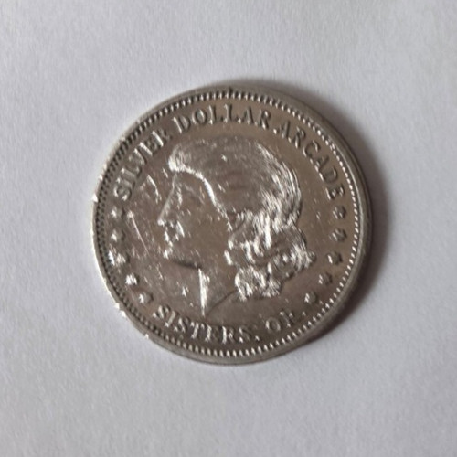 Silver Dollar Arcade Sisters, OR Game Token 24mm