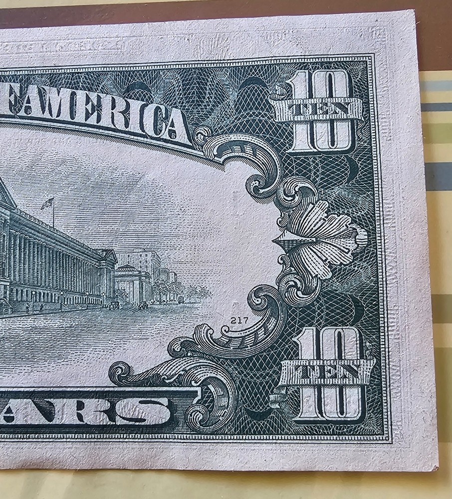 $10 bill 1969c off center front and back with seal misalignment error