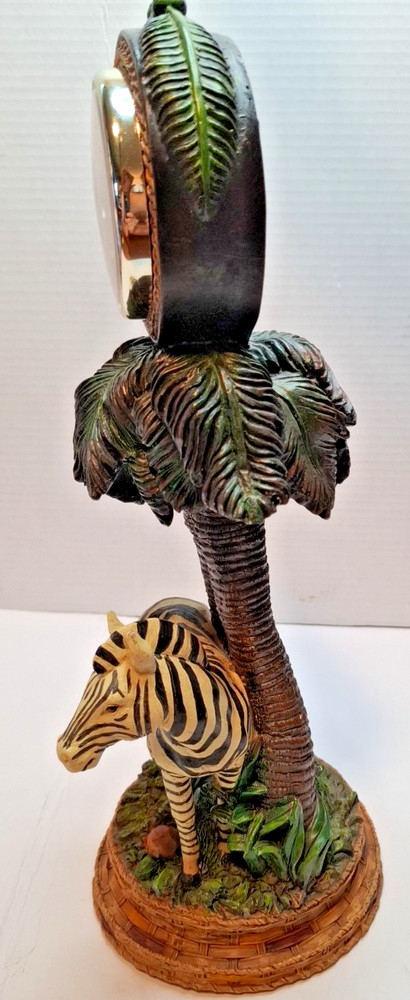 Zebra clock resin sculptured under palm trees 15"Ht. Functioning Clock