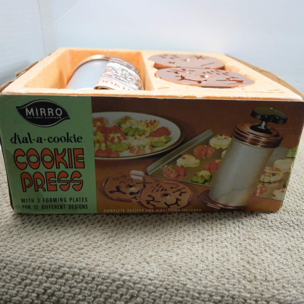 Mirro Dial a cookie cookie press copper colored top and inserts