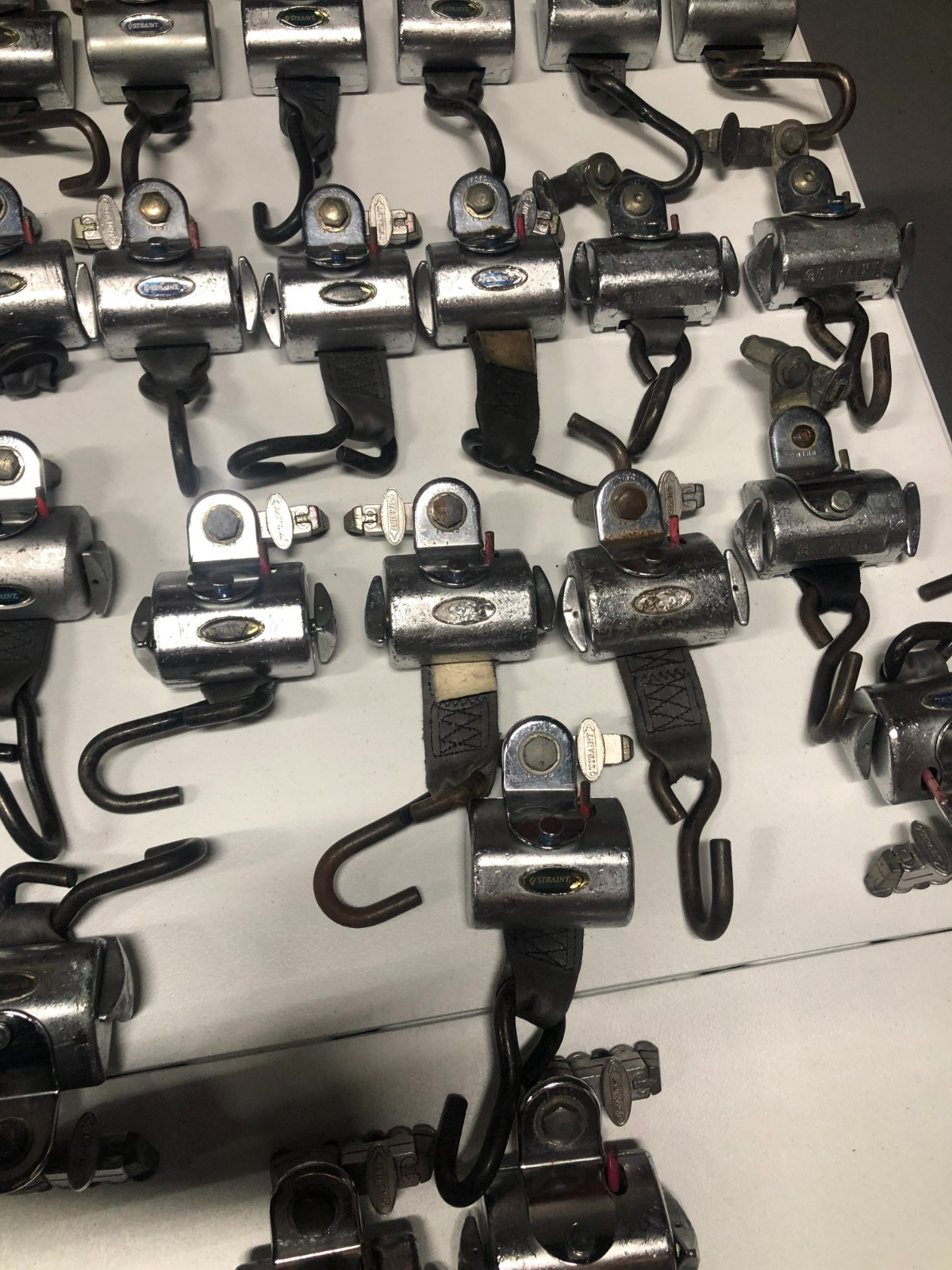 Q'Straint Wheelchair Securement tie Down Retractors.