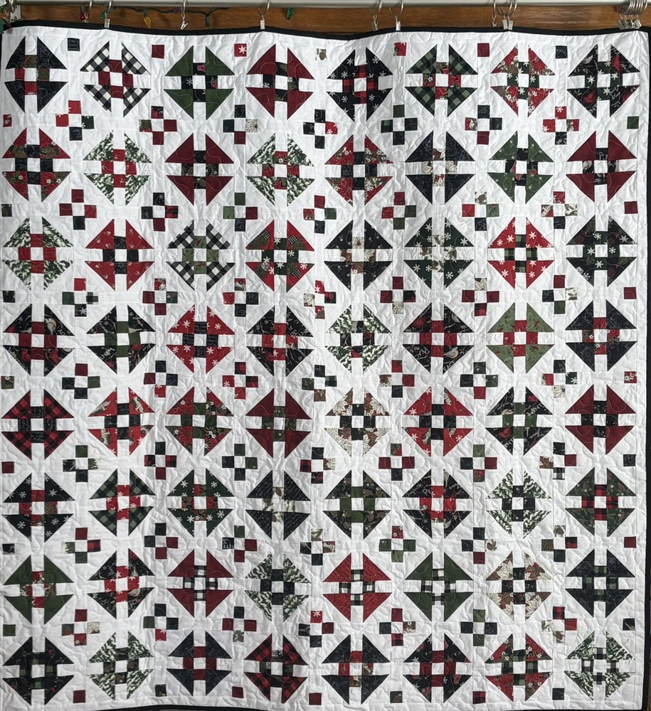 Handmade throw size monkey wrench pattern quilt