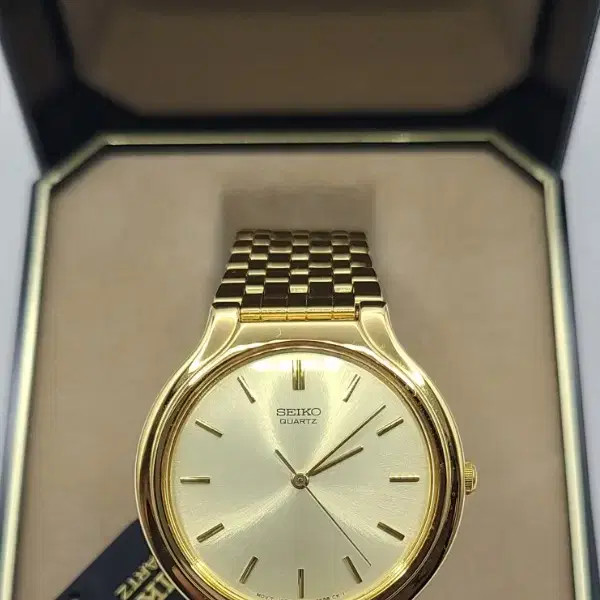 NOS Seiko Quartz Dress Watch Gold SFW400 Champagne Dial