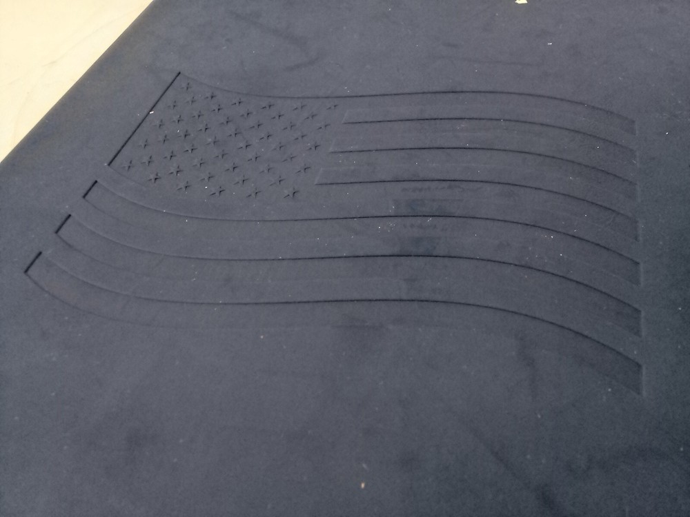 JournalBooks -blue debossed notebook, Flag Symbol