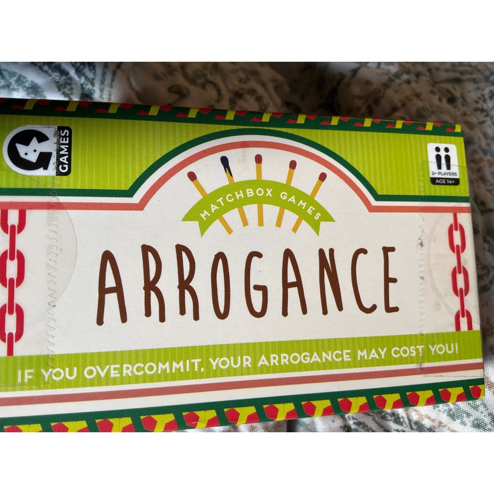 Arrogance matchbox game nip RARE
