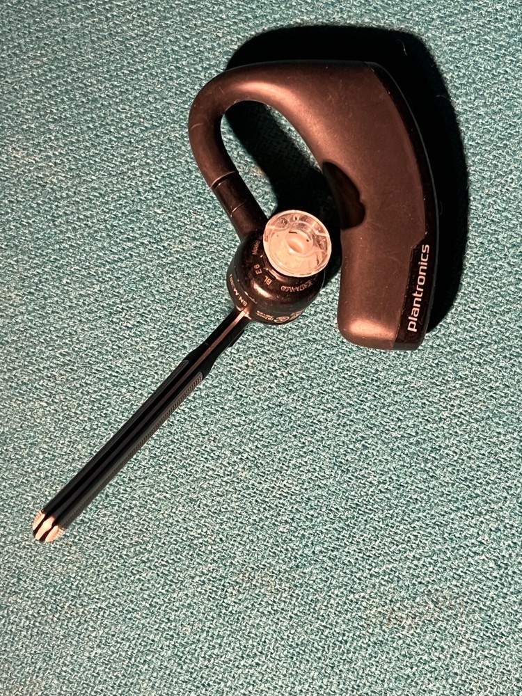 Blue Tooth head set with USB charging/training cord and instructions, working