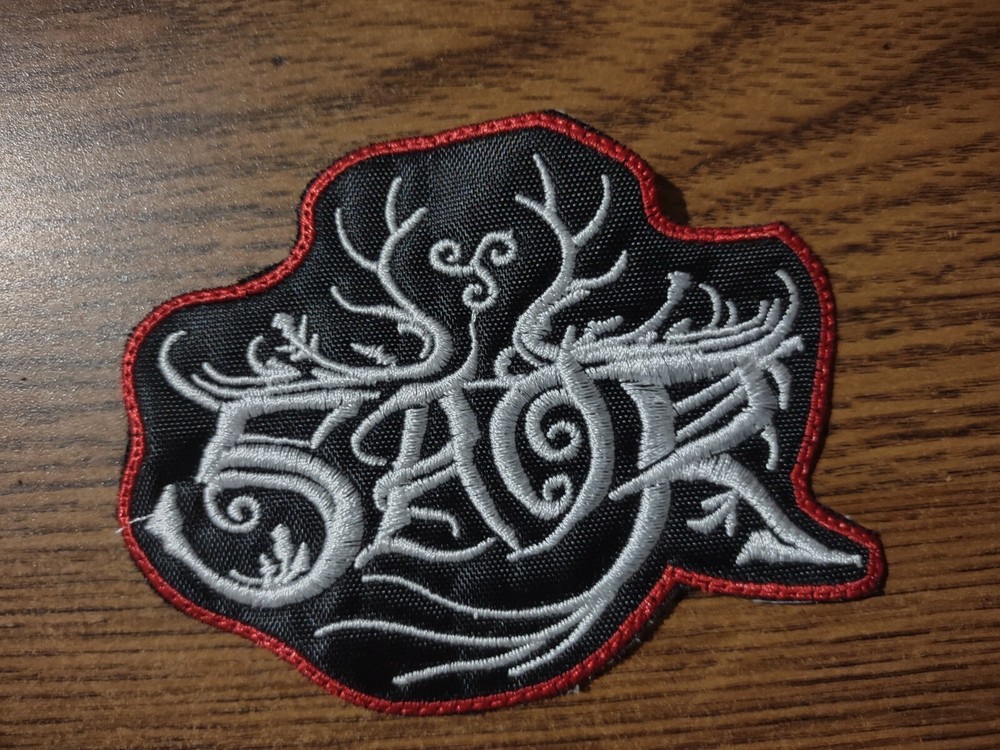 SAOR,SEW ON WHITE WITH RED BORDER EMBROIDERED PATCH