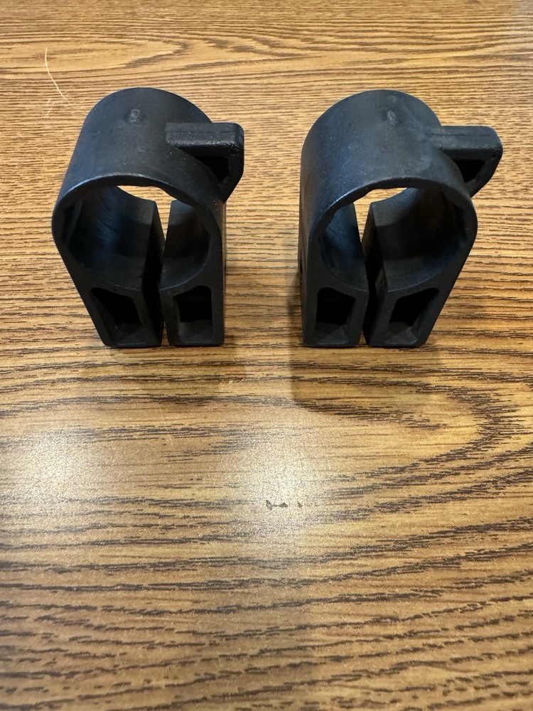 2 Yakima replacement snap around mount round bar