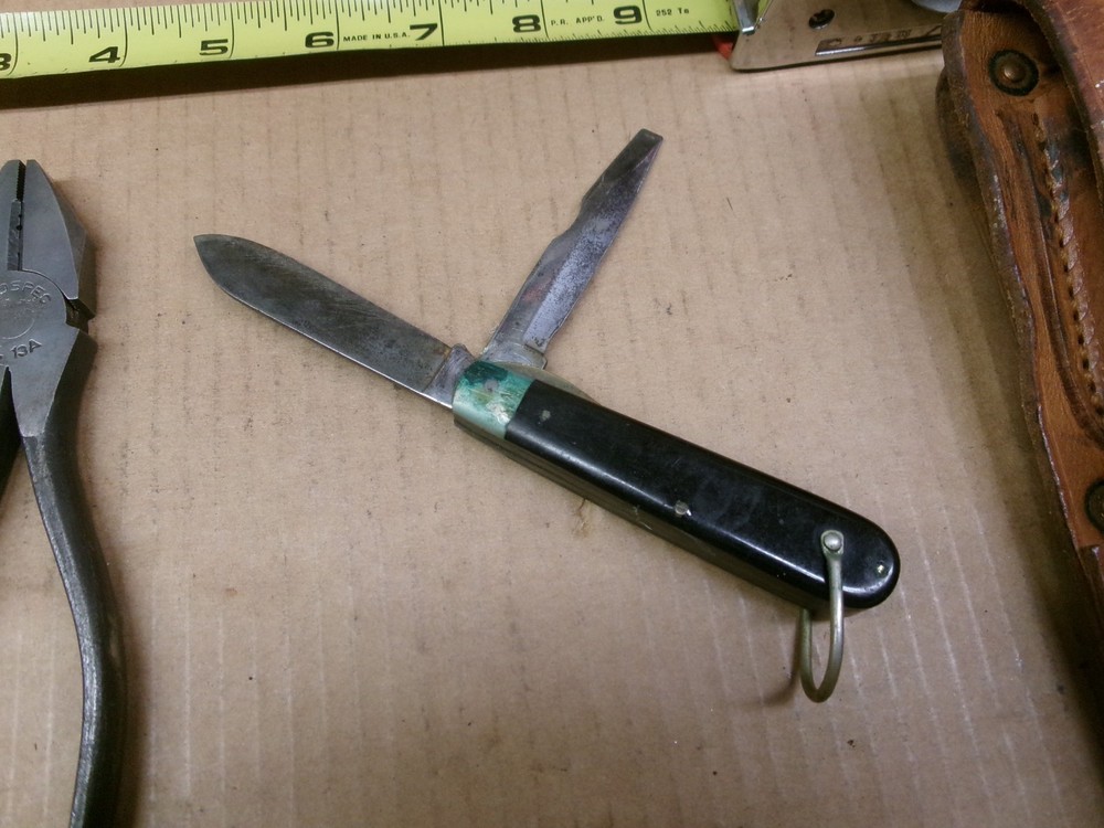 Vintage U.S. Army Signal Corps lineman's tool set.