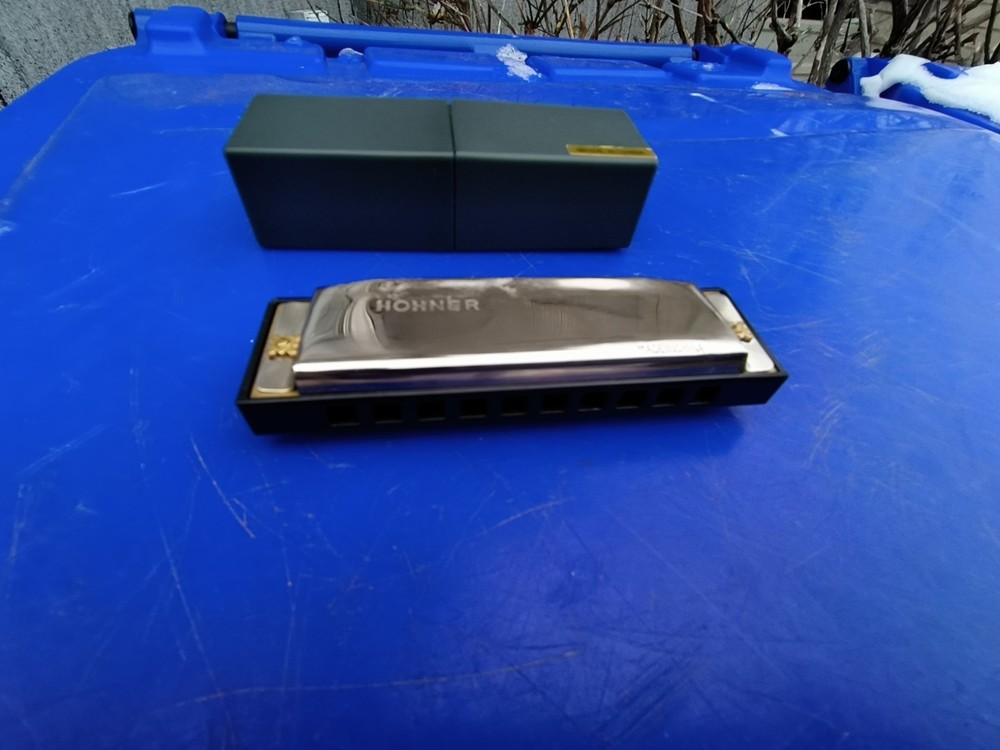 Used HARMONICA SAYS HOHNER ON IT WITH CASE
