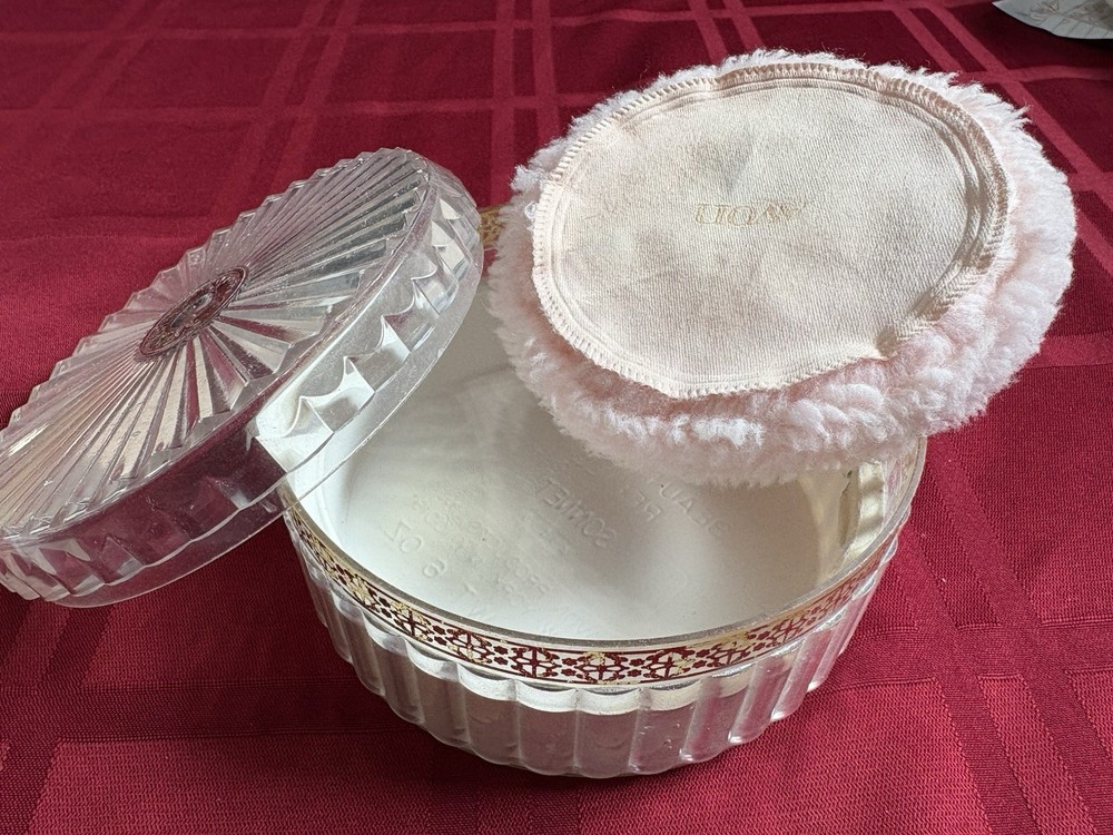 Vintage plastic dusting powder box with puff