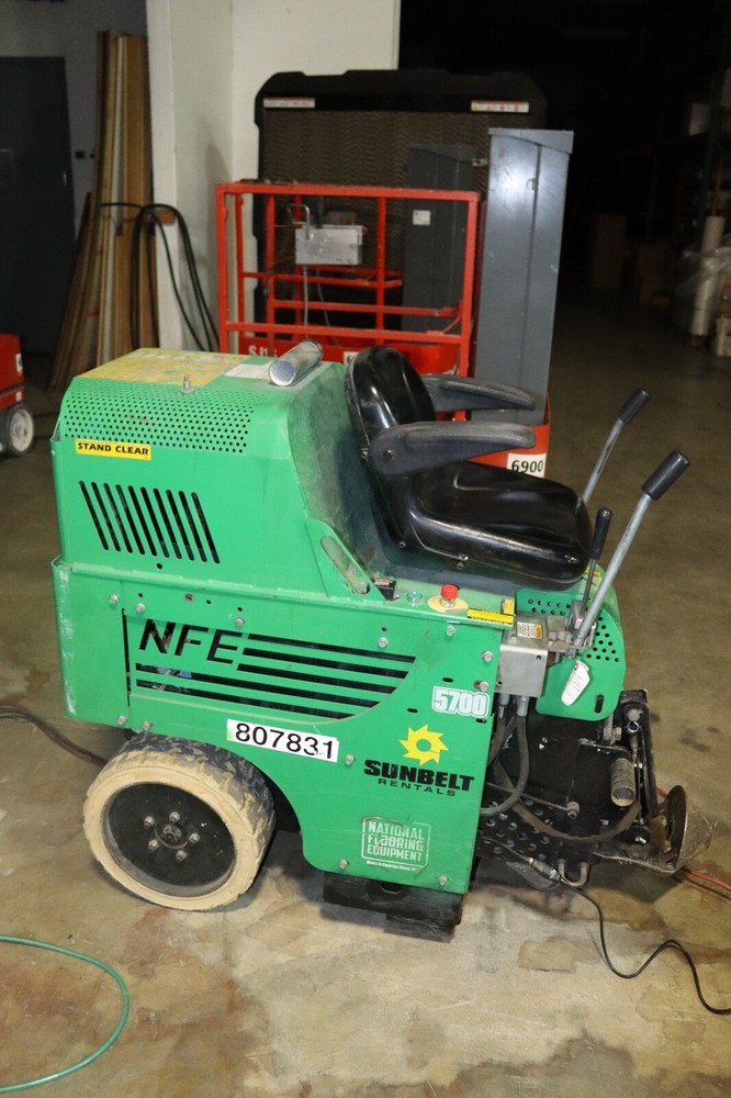 NATIONAL 5700  RIDE ON FLOOR SCRAPER WORKING