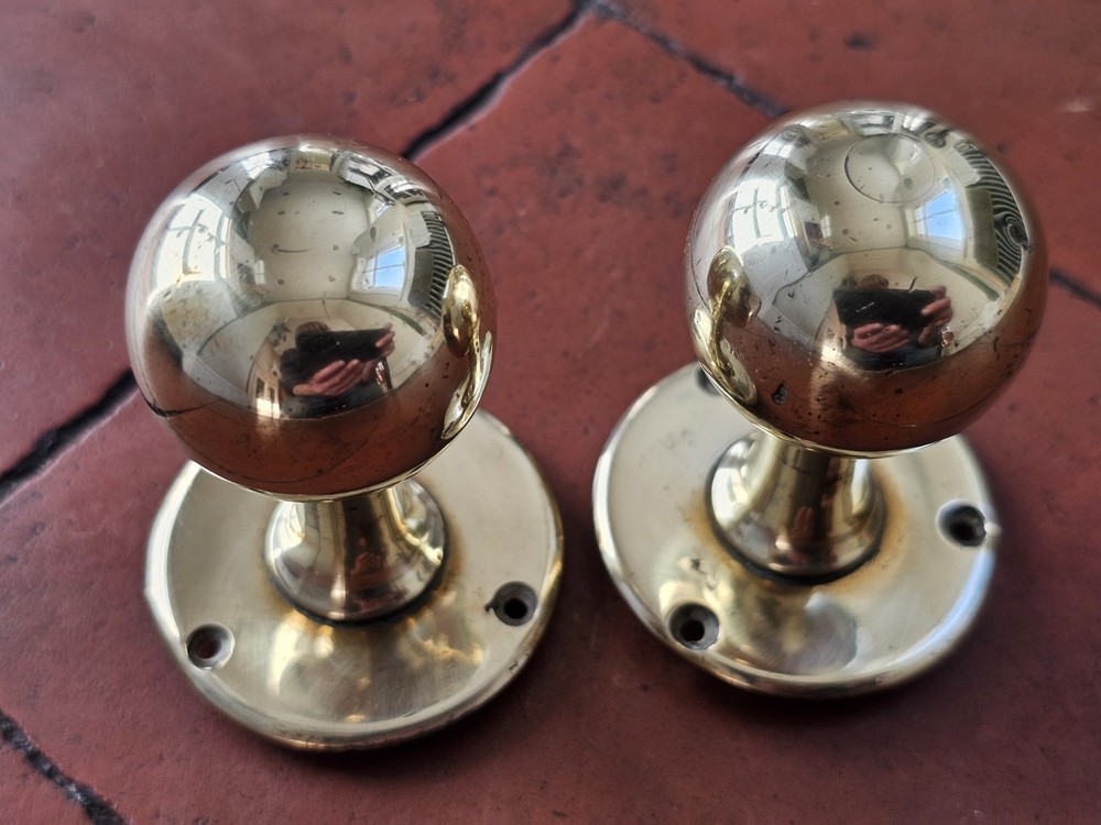 Antique original brass door knobs