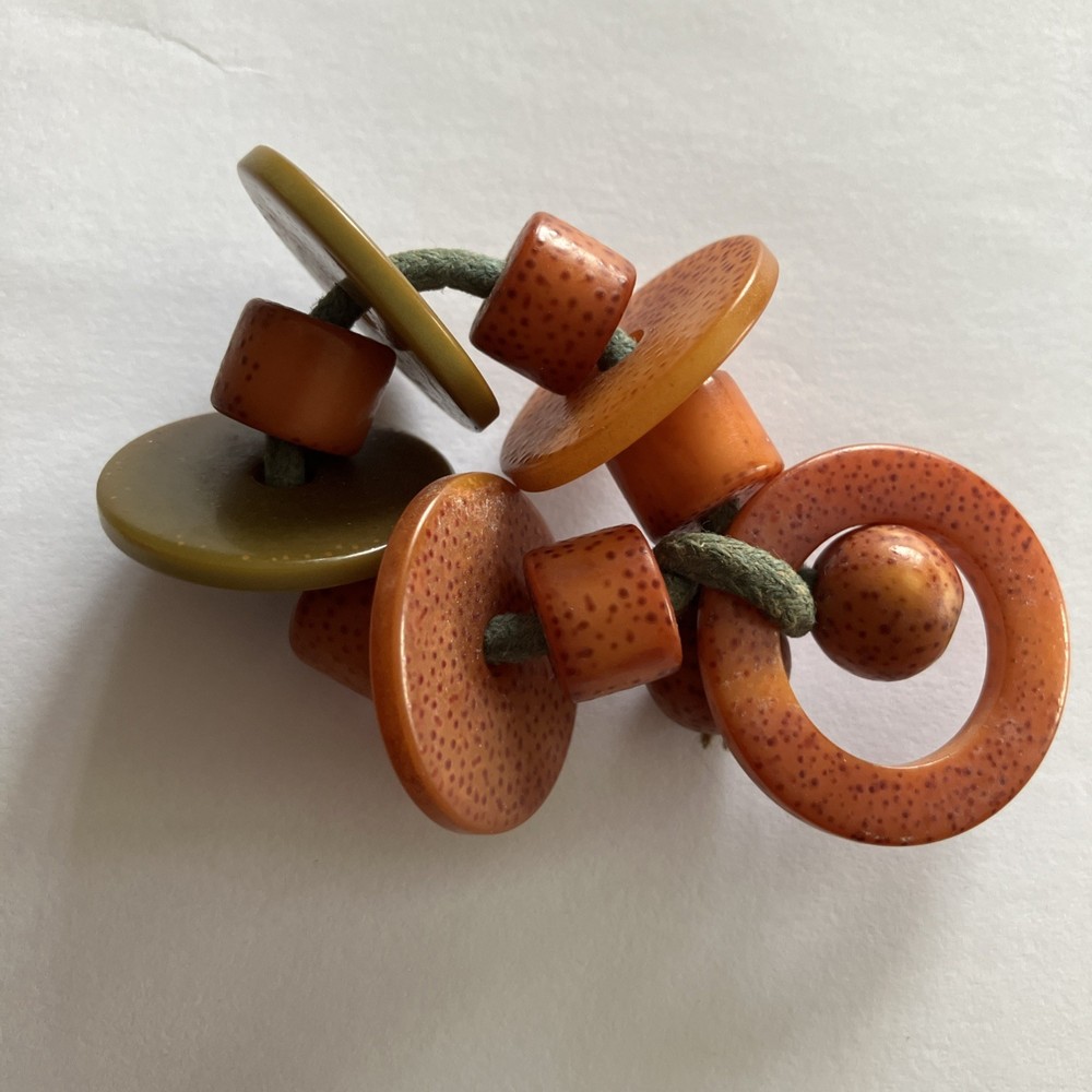 1940’s Orange Green Speckled Bakelite Ring Crib Toy Teething Ring String
