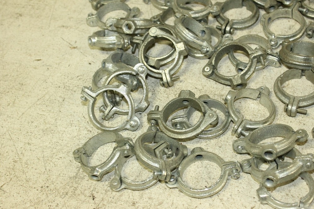 A lot of 1 1/2" Galvanized Split Ring Pipe Hangers