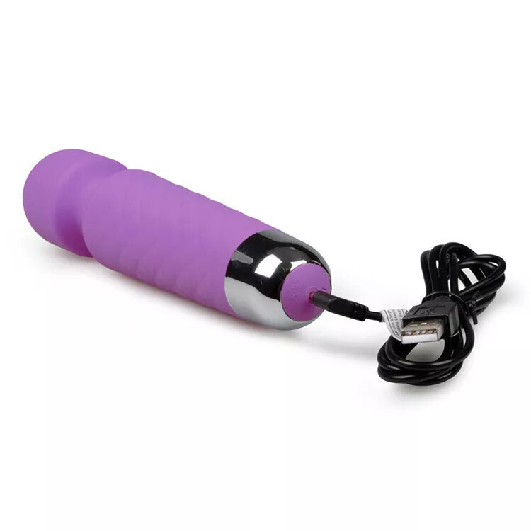 Cordless hand held body massager
