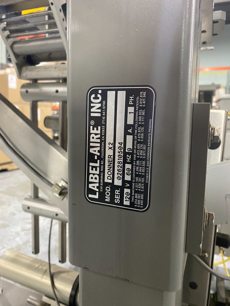 Top and bottom labeler machine